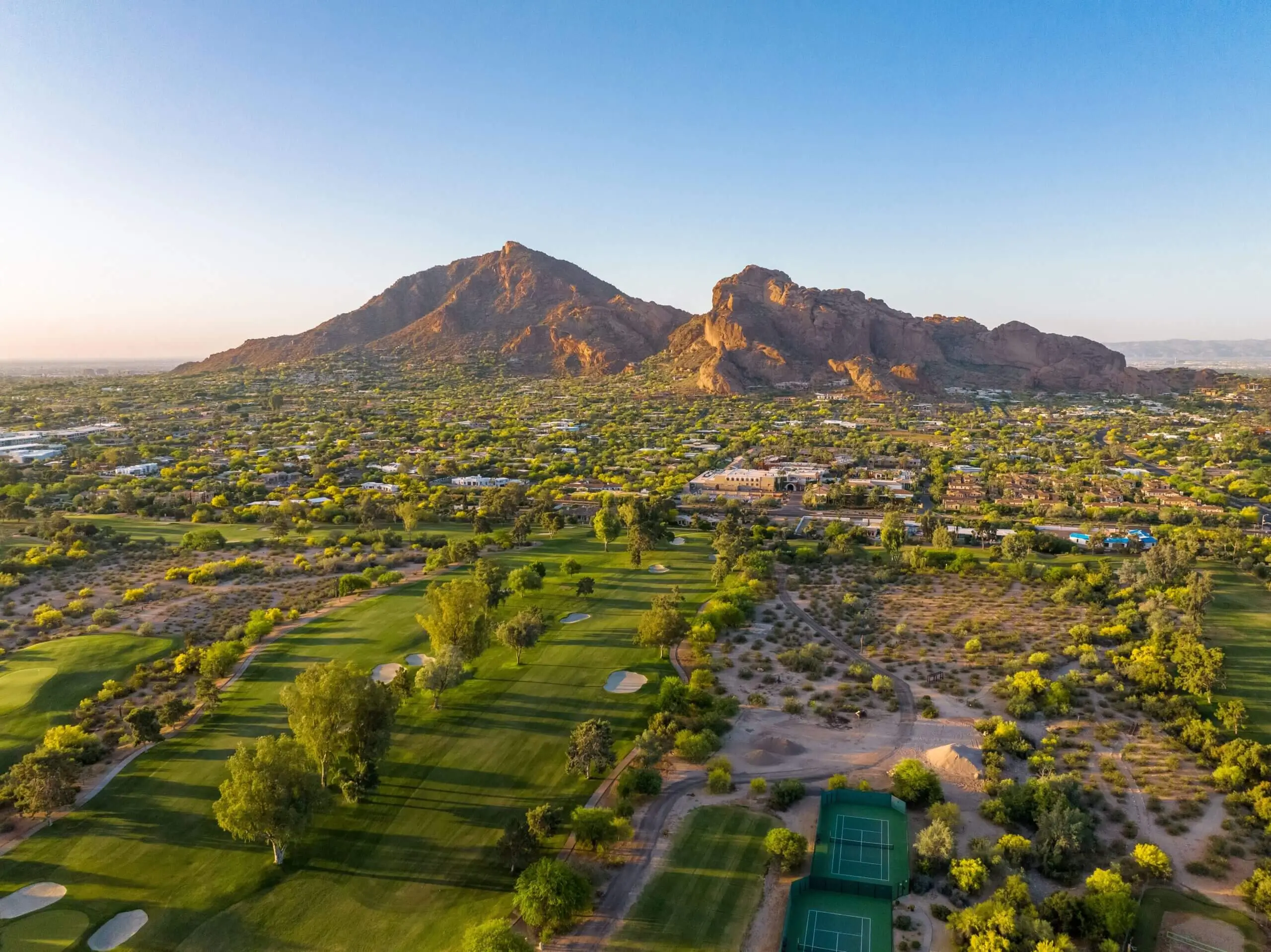 Sunrise over Camelback Mountain in Phoenix, Arizona with a clear sky